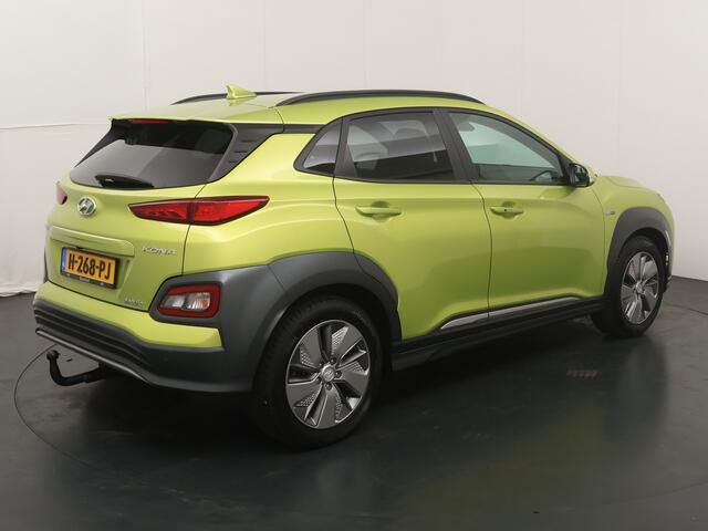 Hyundai Kona EV Premium 64 kWh | Trekhaak | Voorstoelen vewarmd&verkoeld | Warmtepomp | Adapt. Cruise | HUD | Leder |
