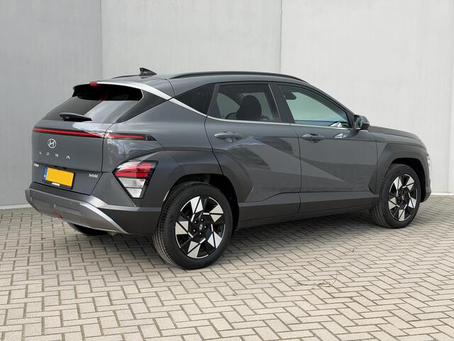Hyundai Kona 1.6 GDI HEV Comfort Smart Automaat / Fabrieksgarantie tot 1-2030 / Stuur- & Stoel verwarming / Achteruitrijcamera / Apple Carplay Android Auto / Keyless Entry/Start / Adaptief cruise control / Draadloze telefoon lader / Climate control /