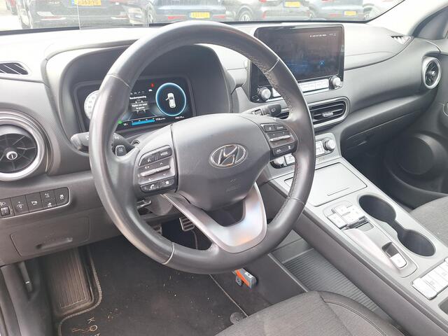 Hyundai Kona EV Fashion 64 kWh | SOH: nnb | 3 Fase | Warmtepomp | Blindspot | Navi | Camera |