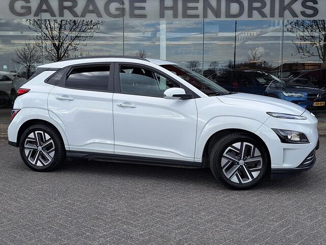 Hyundai Kona EV Fashion 64 kWh | SOH: nnb | 3 Fase | Warmtepomp | Blindspot | Navi | Camera |