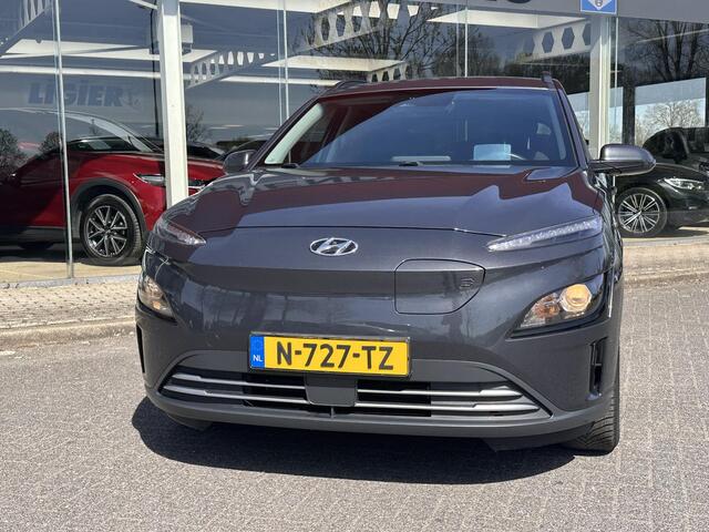 Hyundai Kona EV Fashion 64 kWh | SOH: 96,3%| Facelift | 3 Fase | Warmtepomp | Navi | HUD | Adaptive CC | Camera |