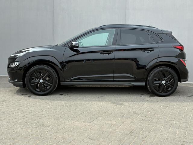 Hyundai Kona EV Fashion Design 64 kWh / SOH 100% / Lederen bekleding / 8 Jaar batterijgarantie / Navigatie / Apple Carplay/Android Auto / Stolverwarming / Head up display / Adaptieve Cruise Control /