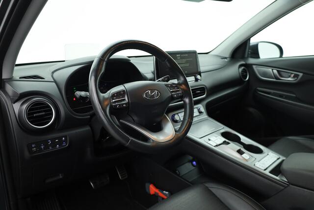 Hyundai Kona EV Premium 64 kWh | SOH 96,3% | Stoelverw./vent. | Afn. Trekhaak | Krell Audio | Camera | HUD | Adapt. Cruise