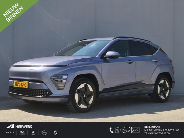 Hyundai Kona Electric Comfort Smart 65.4 kWh / SOH 100% / Fabrieksgarantie tot 04-2030 / Stuur- & Stoelverwarming / CCS snelladen / Achteruitrijcamera / Head Up Display / Adaptief cruise control / Keyless Entry/Start / Apple Carplay Android Auto /
