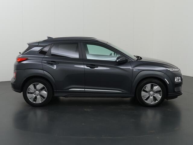 Hyundai Kona EV Fashion 64 kWh | SOH 96% | HUD | Navigatie | Camera | DAB | Apple CarPlay/ Android Auto | Adaptieve Cruise Control | KRELL Audio |