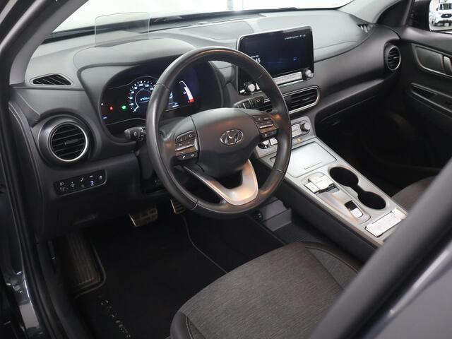 Hyundai Kona EV Fashion 64 kWh | SOH 96% | HUD | Navigatie | Camera | DAB | Apple CarPlay/ Android Auto | Adaptieve Cruise Control | KRELL Audio |