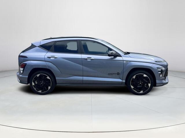 Hyundai Kona Electric N Line Business 64.8 kWh | Uit voorraad leverbaar! | Adaptieve Cruise Control | Parkeersensoren voor en achter | Dodehoekdetectie | Navigatie | Stoel / Stuurverwarming | Keyless entry en start| Uit Voorraad Leverbaar |