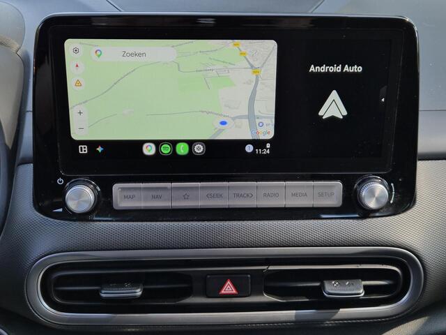 Hyundai Kona EV Pure 64 kWh / SOH 100% / CCS snelladen / Stoelverwarming / Krell Audio Systeem / Apple Carplay Android Auto / Draadloze telefoon lader / Achteruitrijcamera / Keyless Entry/Start / Parkeersensoren achter / Navigatie /