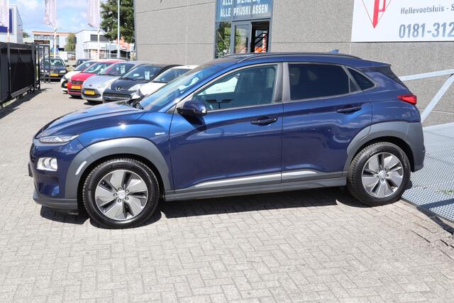 Hyundai Kona EV Fashion 64 kWh Nederlandse auto/Stoelverwarming/Achteruitrijcamera/Apple carplay/Warmtepomp/Adaptieve cruise control/Lane assist/Dodehoek assistent/Climate control/Navigatie