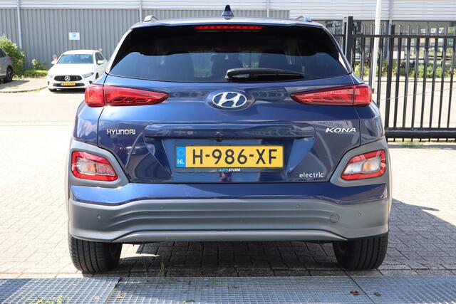 Hyundai Kona EV Fashion 64 kWh Nederlandse auto/Stoelverwarming/Achteruitrijcamera/Apple carplay/Warmtepomp/Adaptieve cruise control/Lane assist/Dodehoek assistent/Climate control/Navigatie