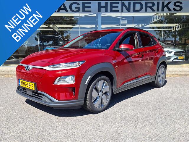 Hyundai Kona EV Fashion 64 kWh | SOH: 95,1% | 3 Fase | Warmtepomp | LED | Blindspot | Stoelverwarming | All Season | HUD |