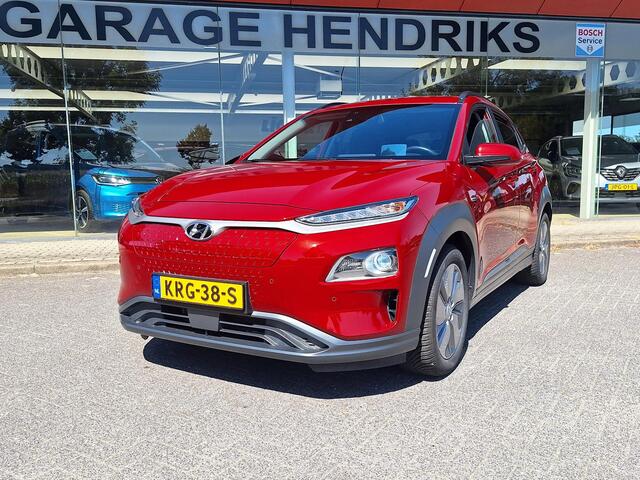 Hyundai Kona EV Fashion 64 kWh | SOH: 95,1% | 3 Fase | Warmtepomp | LED | Blindspot | Stoelverwarming | All Season | HUD |