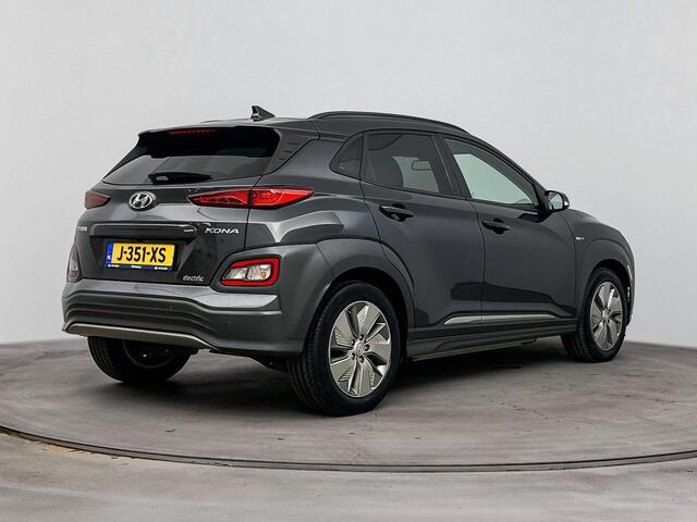 Hyundai Kona EV Fashion 64 kWh | Achteruitrij camera | Navigatie | Adaptive cruise | Head up display | Dodehoek detectie |