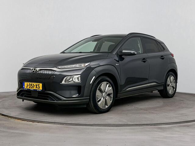 Hyundai Kona EV Fashion 64 kWh | Achteruitrij camera | Navigatie | Adaptive cruise | Head up display | Dodehoek detectie |