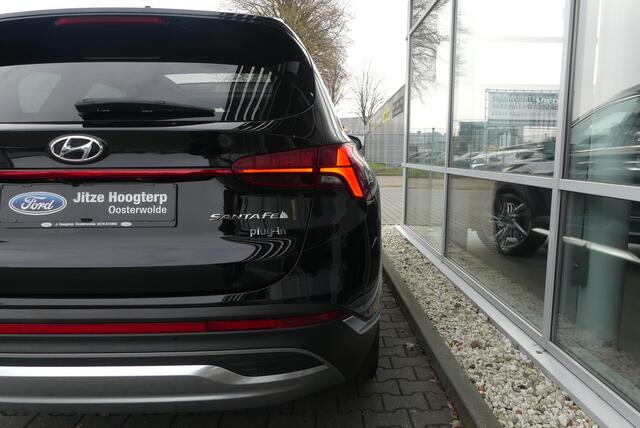 Hyundai SANTA FE 1.6 T-GDI PHEV Premium Plus Sky 7p. TREKHAAK AFNEEMBAAR (1.350KG), PANO, 360° CAMERA, HUD, MEMORY, WINTER PACK, ADAPT. CRUISE, CLIMA, NAVI, PDC V&A, APPLE CARPLAY/ANDROID AUTO, BLIS, KEYLESS, KRELL, ELEKT. ACHTERKLEP, ELEKT. PASSAGIERSSTOEL, STOELVENTILAT
