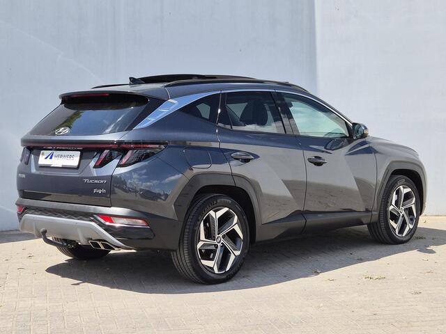 Hyundai TUCSON 1.6 T-GDI PHEV Premium Sky 4WD Automaat / Trekhaak afneembaar / Trekgewicht 1350 kg / Glazen schuif- en kanteldak / Stuur- en Stoelverwarming / Rondomzicht camera / Apple Carplay Android Auto / Elektrische achterklep /
