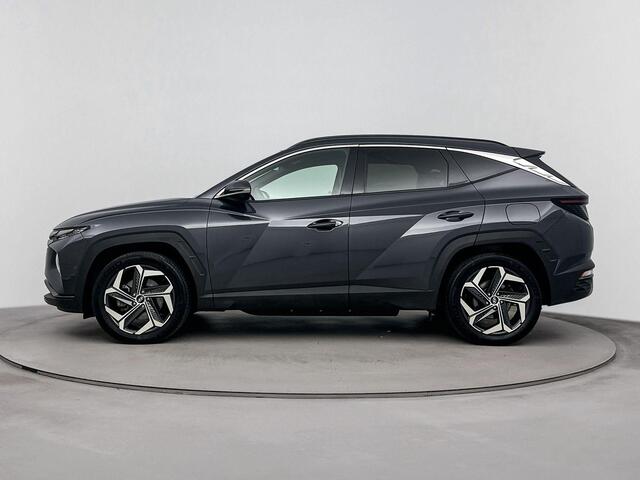 Hyundai TUCSON 1.6 T-GDI PHEV Premium 4WD | Apple carplay | Navi | Cruise control | Climate control | Electrische verwarmbare stoelen| Leder |