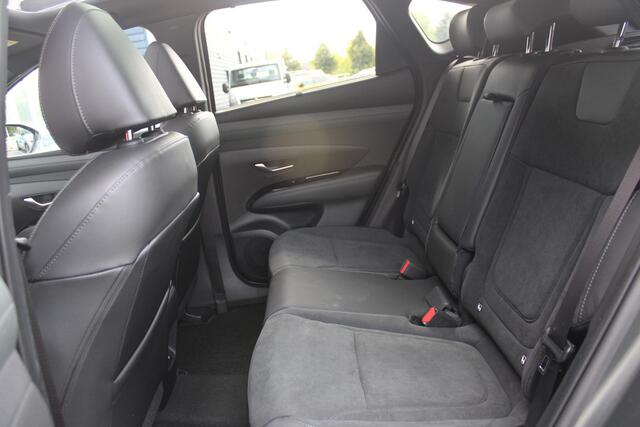 Hyundai TUCSON 1.6 T-GDI PHEV 252PK 20TH ANNIVERSARY+SKY *NIEUW* | PANORAMISCH SCHUIF/KANTELDAK | STUUR / STOELVERWARMING | FULL LED KOPLAMPEN | HALF ALCANTARA / LEDER 20TH ANNIVERSARY DESIGN MET GROENE STIKSELS | NAVIGATIE | ADAPTIVE CRUISE CONTROL | DRAADLOOS APPLE CA