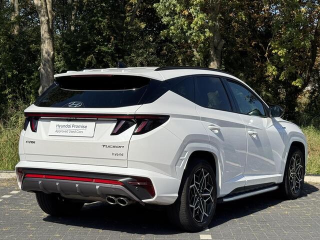 Hyundai TUCSON 1.6 T-GDI HEV N Line | Sidesteps | 1650 kg trekvermogen | Geïntegreerde navigatiesysteem | Stoelverwarming | Android Auto & Apple Carplay | 19'' Lichtmetalen velgen |