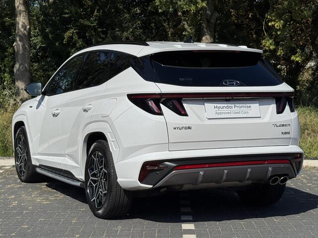 Hyundai TUCSON 1.6 T-GDI HEV N Line | Sidesteps | 1650 kg trekvermogen | Geïntegreerde navigatiesysteem | Stoelverwarming | Android Auto & Apple Carplay | 19'' Lichtmetalen velgen |