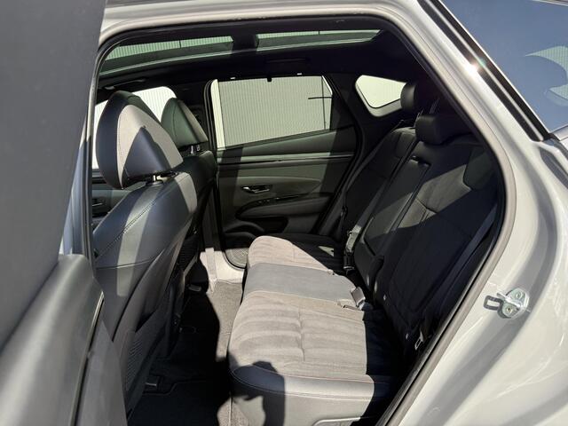 Hyundai TUCSON 1.6 T-GDI PHEV N Line Sky 4WD / Elektr. verstelbare voorstoelen / 19' LM met All Season banden / Open dak / Stoelverwarming en ventilatie / 360 camera / Dealer onderhouden /