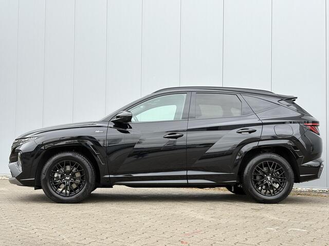 Hyundai TUCSON 1.6 T-GDI HEV N Line Sky / Trekhaak (1650kg) / Elektrisch glazen panorama-dak / Kunstlederen/suede bekleding / Stoelverwarming voor/achter / All-season banden /