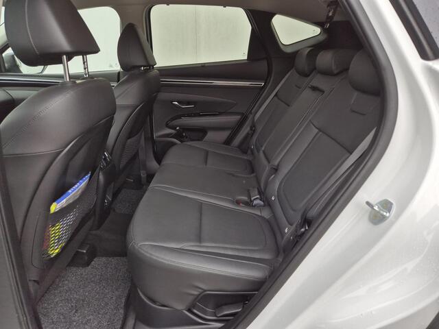 Hyundai TUCSON 1.6 T-GDI HEV 230 PK Premium Automaat / Trekgewicht 1650 kg / Apple Carplay Android Auto / Stuur- en Stoelverwarming / Rondomzicht camera / Climate Control / Stoelventilatie voor /