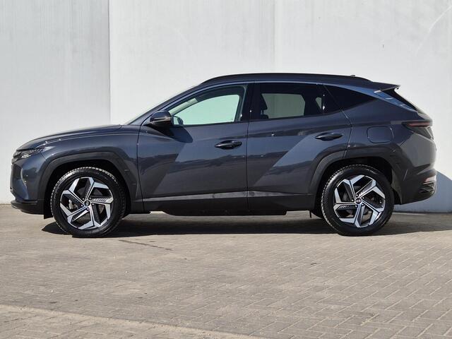 Hyundai TUCSON 1.6 T-GDI PHEV Comfort Smart 4WD Automaat / Accu SoH 100% / Trekhaak / 1350KG Trekgewicht / Navigatie / Achteruitrijcamera / Apple Carplay Android Auto / Stuur- en Stoelverwarming / Adaptief cruise control / Dealer onderhouden /