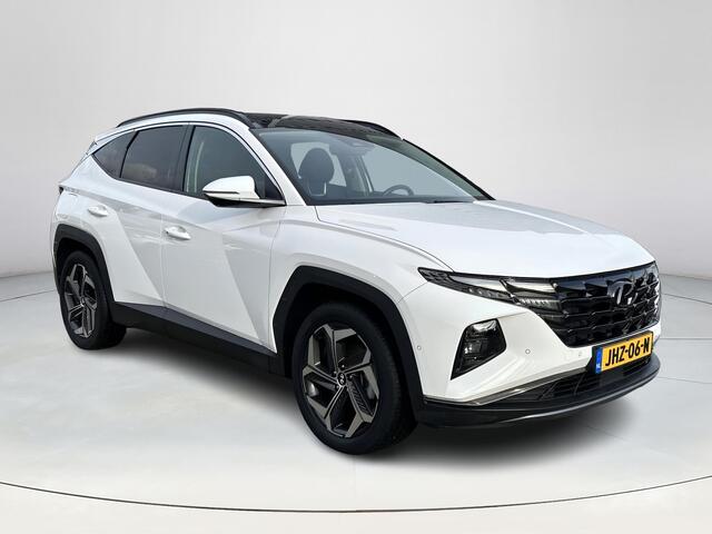 Hyundai TUCSON 1.6 T-GDI PHEV Premium Sky 4WD | Stoelverwarming/verkoeling | Stuurverwarming | Schuif-kantel dak | Lederen bekleding | 2e zit-rij bankverwarming | 360graden camera | 3-zone klimaatcontrole | Elektrische geheugen stoelen | KRELL- premium audiosysteem |