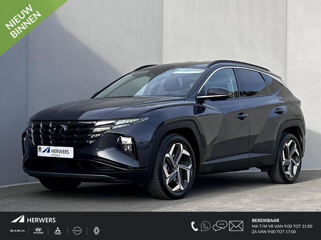 Hyundai TUCSON 1.6 T-GDI HEV Comfort Smart Automaat / Fabrieksgarantie tot 02-2028 ** / Dealer onderhouden / Navigatie / Achteruitrijcamera / Stuur- en stoelverwarming / Apple Carplay Android / 19" LM + All Season banden /
