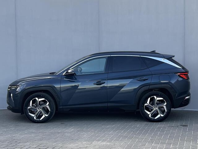 Hyundai TUCSON 1.6 T-GDI PHEV Plug-in Comfort 4WD Automaat / Fabrieksgarantie tot 04-2028 ** / Dealer onderhouden / Navigatie / Achteruitrijcamera / Apple Carplay Android / Dode hoek detectie / Stoelverwarming / 19" LM wielen /