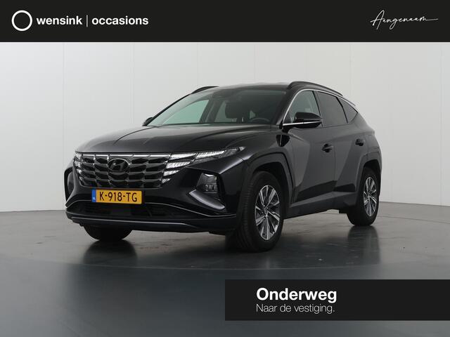 Hyundai TUCSON 1.6 T-GDI HEV Comfort Smart | Trekhaak | Parkeercamera | Stoel/Stuurwielverwarming | Krell Audio | Elektr. Achterklep | Navigatie |