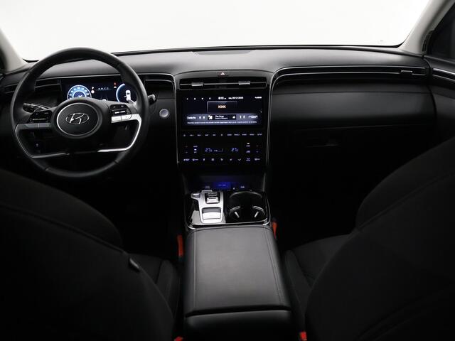 Hyundai TUCSON 1.6 T-GDI HEV Comfort Smart | Trekhaak | Parkeercamera | Stoel/Stuurwielverwarming | Krell Audio | Elektr. Achterklep | Navigatie |
