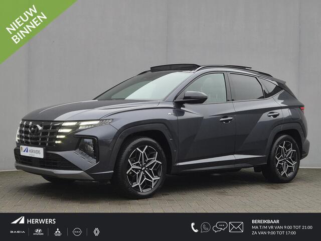 Hyundai TUCSON 1.6 T-GDI PHEV N Line Sky 4WD Automaat / Fabrieksgarantie tot 23-09-2027 / Accu SOH 100% / EAER bereik 62 km bereik stad 74 km / Trekgewicht 1350 kg / Glazen schuif- en kanteldak / Stuur-, Stoel en Achterbank verwarming /