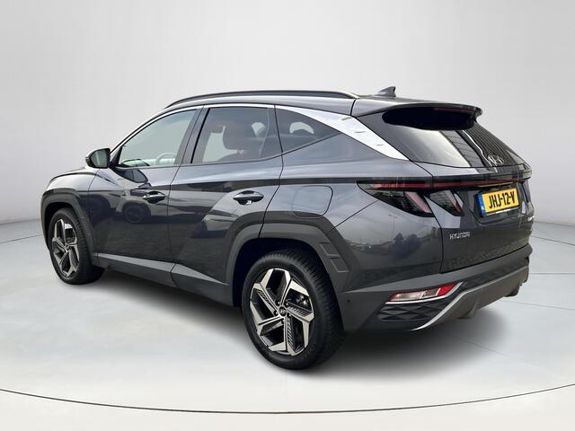 Hyundai TUCSON 1.6 T-GDI HEV Premium Sky | Stuurverwarming | Stoel verwarming/verkoeling | Elektrisch verstelbare stoelen | 360 camera | Lederen bekleding | Navigatie | Krell premium-audiosysteem