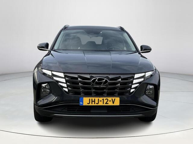 Hyundai TUCSON 1.6 T-GDI HEV Premium Sky | Stuurverwarming | Stoel verwarming/verkoeling | Elektrisch verstelbare stoelen | 360 camera | Lederen bekleding | Navigatie | Krell premium-audiosysteem