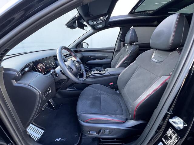 Hyundai TUCSON 1.6 T-GDI HEV 230pk N Line Sky Fabrieksgarantie tot 04-2029 / Dealer onderhouden / 1.650kg Trekgewicht / Panorama schuifdak / Stuur-, stoel- en achterbankverwarming / Apple Carplay Android / 19" LM wielen /