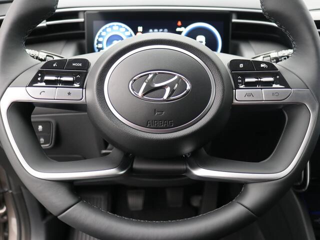 Hyundai TUCSON 1.6 T-GDI MHEV Comfort Smart / Lage KM-stand 12994 km / 1ste Eigenaar / Navigatie / Trekhaak / 1650KG Trekgewicht / Camera / Climate & Cruise Control / Elektrische Achterklep / Krell Audio / Navigatie / Stoelverwarming / Apple Carplay / Fabrieksgarantie t