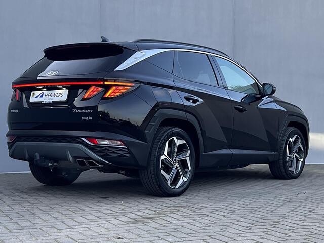 Hyundai TUCSON 1.6 T-GDI PHEV Comfort Smart 4WD Automaat / Fabrieksgarantie tot 09-2029 / Trekhaak 1.350 kg / EAER 62 km / Navigatie / Stuur-, stoel- en achterbankverwarming / Apple Carplay Android / 19" LM wielen /