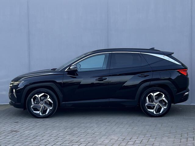 Hyundai TUCSON 1.6 T-GDI PHEV Comfort Smart 4WD Automaat / Fabrieksgarantie tot 09-2029 / Trekhaak 1.350 kg / EAER 62 km / Navigatie / Stuur-, stoel- en achterbankverwarming / Apple Carplay Android / 19" LM wielen /