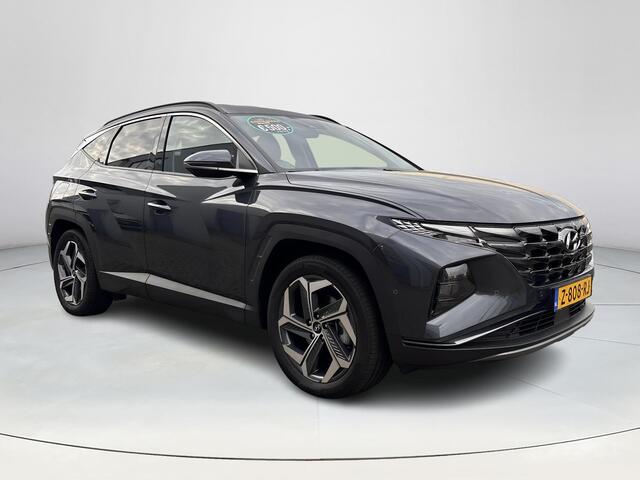 Hyundai TUCSON 1.6 T-GDI PHEV Premium 4WD Lederen bekleding | Stoel- en stuurverwarming | 4WD | Navigatiesysteem | Climate Control | Adaptieve Cruise Control | Plug Inn hybride | Full options | Resterende fabrieksgarantie