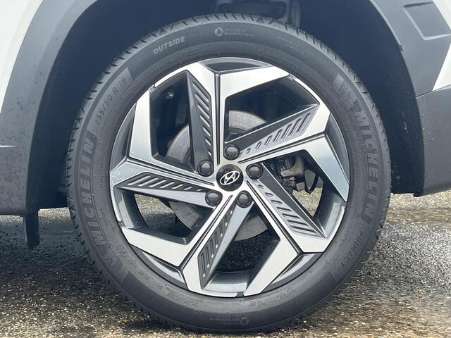 Hyundai TUCSON 1.6 T-GDI 265PK PHEV Comfort 4WD | Lage kmstand Plug-inn | Geïntegreerde navigatiesysteem | 19'' Bi-color Lichtmetalen velgen | Vierwielaandrijving |
