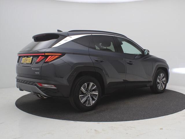 Hyundai TUCSON 1.6 T-GDI HEV Comfort AUTOMAAT / Navigatie / NL Auto / Apple CarPlay & Android Auto / 1650KG Trekgewicht / Achteruitrijcamera / 1ste Eigenaar / Climate control / Adaptieve Cruise control / Stoelverwarming / Dealeronderhouden /
