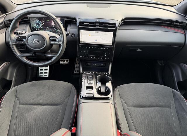 Hyundai TUCSON 1.6 T-GDI PHEV N Line 4WD Automaat / Fabrieksgarantie tot 12-2026 / Dealer Onderhouden / 360 Camera / Dodehoek / Apple Carplay & Android Auto / Cruise control adaptief met Stop&Go / Stoel & Stuur verwarming / Stoelventilatie / Elektr. Stoelen / Elektr. Ac