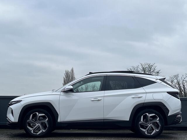 Hyundai TUCSON 1.6 T-GDI HEV 230pk Premium Sky | SCHUIFKANTELDAK | LEDEREN BEKLEDING | STOELVENTILATIE & VERWARMING | BLIND SPOT CAMERA | NED. AUTO |