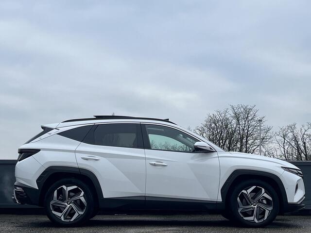 Hyundai TUCSON 1.6 T-GDI HEV 230pk Premium Sky | SCHUIFKANTELDAK | LEDEREN BEKLEDING | STOELVENTILATIE & VERWARMING | BLIND SPOT CAMERA | NED. AUTO |