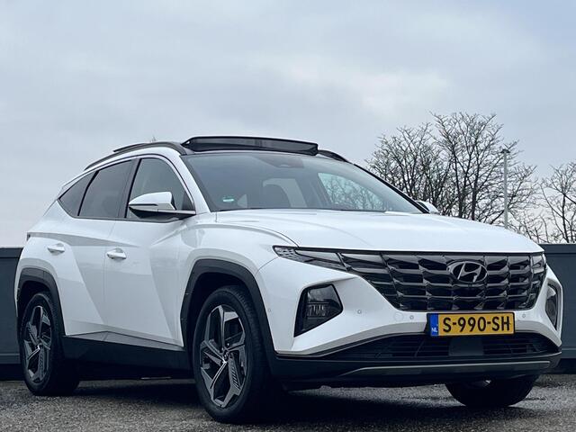 Hyundai TUCSON 1.6 T-GDI HEV 230pk Premium Sky | SCHUIFKANTELDAK | LEDEREN BEKLEDING | STOELVENTILATIE & VERWARMING | BLIND SPOT CAMERA | NED. AUTO |