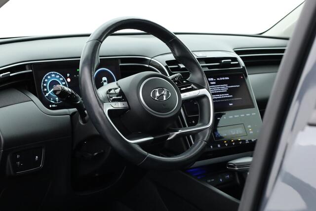 Hyundai TUCSON 1.6 T-GDI MHEV Comfort | Pano | Trekhaak | Camera | Stoel- Stuurverw. | Nav | CarPlay | Cruise