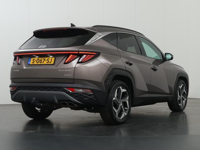 Hyundai TUCSON 1.6 T-GDI HEV Premium | Trekhaak | Lederen bekleding | Ele.verstelbare stoelen + geheugen | Stoel/Stuur verwarming | Navigatie | DAB | 360 Camera | Apple CarPlay/Android Auto | Stoelkoeling | Adaptieve Cruise Control | Krell Audio |
