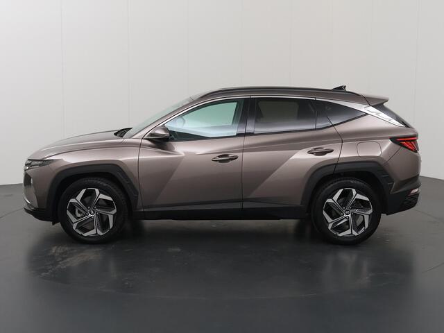 Hyundai TUCSON 1.6 T-GDI HEV Premium | Trekhaak | Lederen bekleding | Ele.verstelbare stoelen + geheugen | Stoel/Stuur verwarming | Navigatie | DAB | 360 Camera | Apple CarPlay/Android Auto | Stoelkoeling | Adaptieve Cruise Control | Krell Audio |